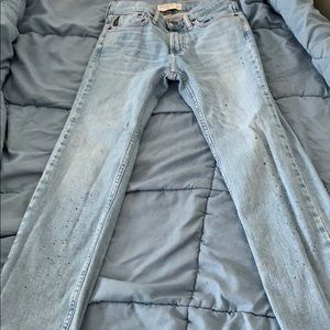 Light blue paint splatter jeans